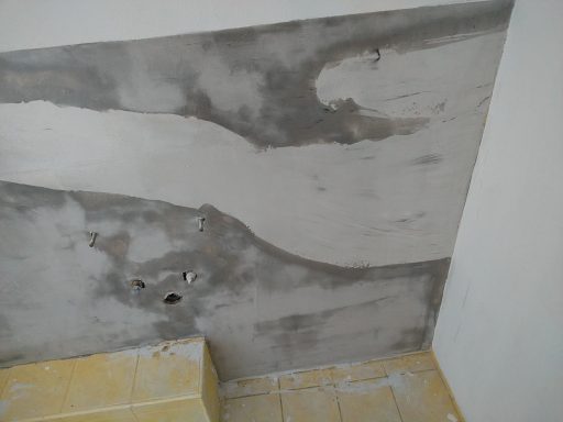 Spachteltechnik mit Epoxyd für fugenlose Bäder